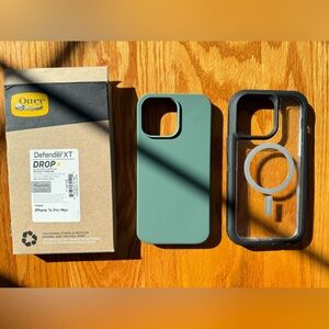 iPhone 14 Pro Max cases. OtterBox Defender XT and very well made light green.